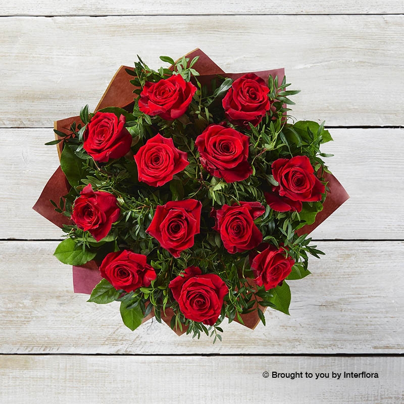 Dramatic Dozen  12 red rose Hand tied