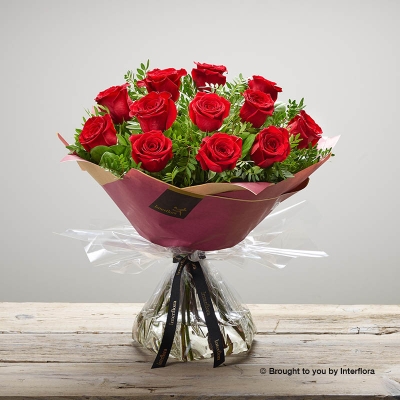 Dramatic Dozen  12 red rose Hand tied